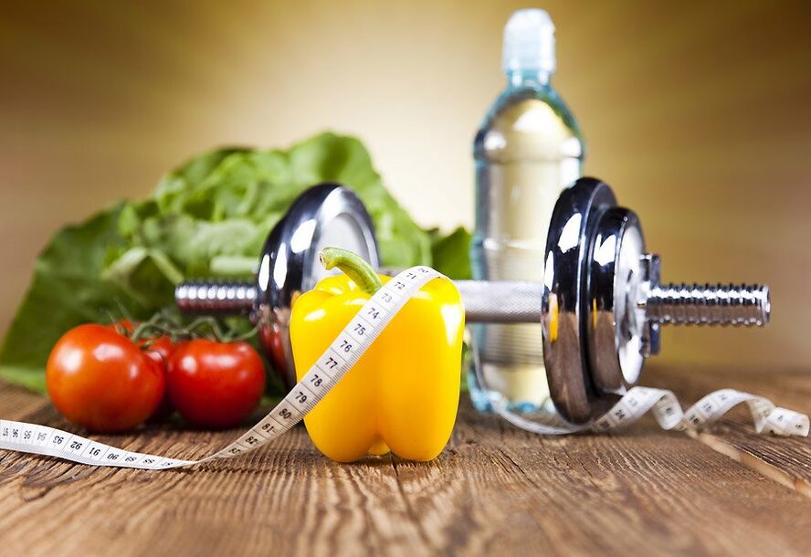 Dumbbell, λαχανικά και εκατοστά ζώνη